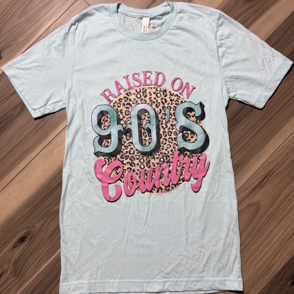 Bella Canvas Raised on 90s Country Graphic Tee Light Blue XS Leopard Print